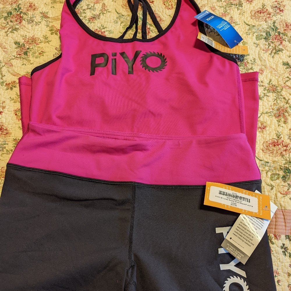 Beachbody top and shorts, brand new with tags, size L
